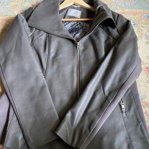 Leather bomber with stretch inserts on sides and arms.